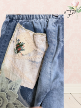 Load image into Gallery viewer, Upcycled bleached jeans LOVE floral patchwork large asymmetric roses vintage Fits most to Large
