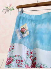 Load image into Gallery viewer, upcycled hand dyed linen skirt with bright vintage textiles asymmetric hemline fits to 1X
